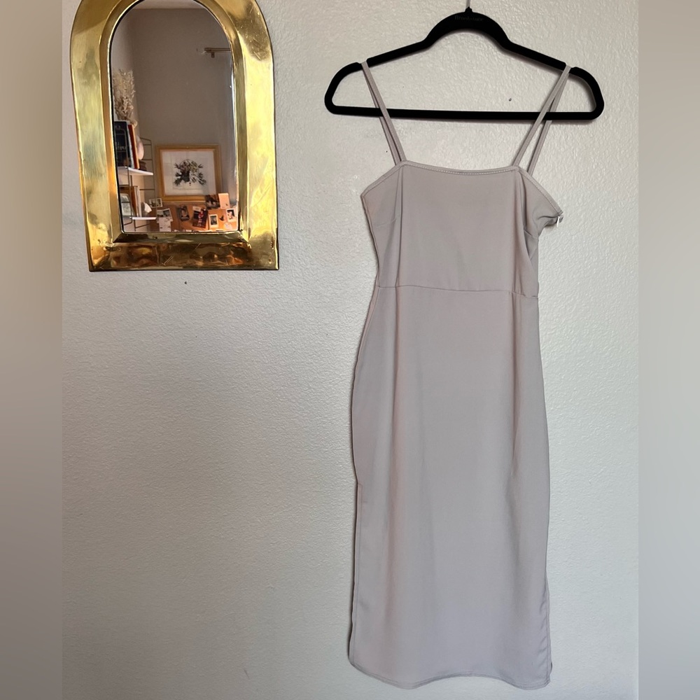 Lightweight wedding guest dress. Light grey fitted midi dress with slits